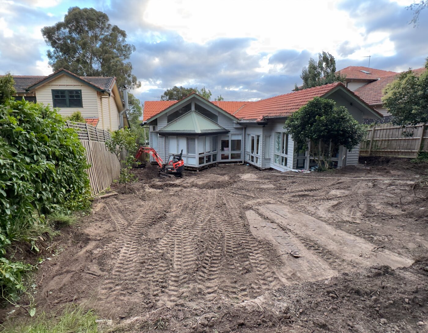 Tight access backyard site cut