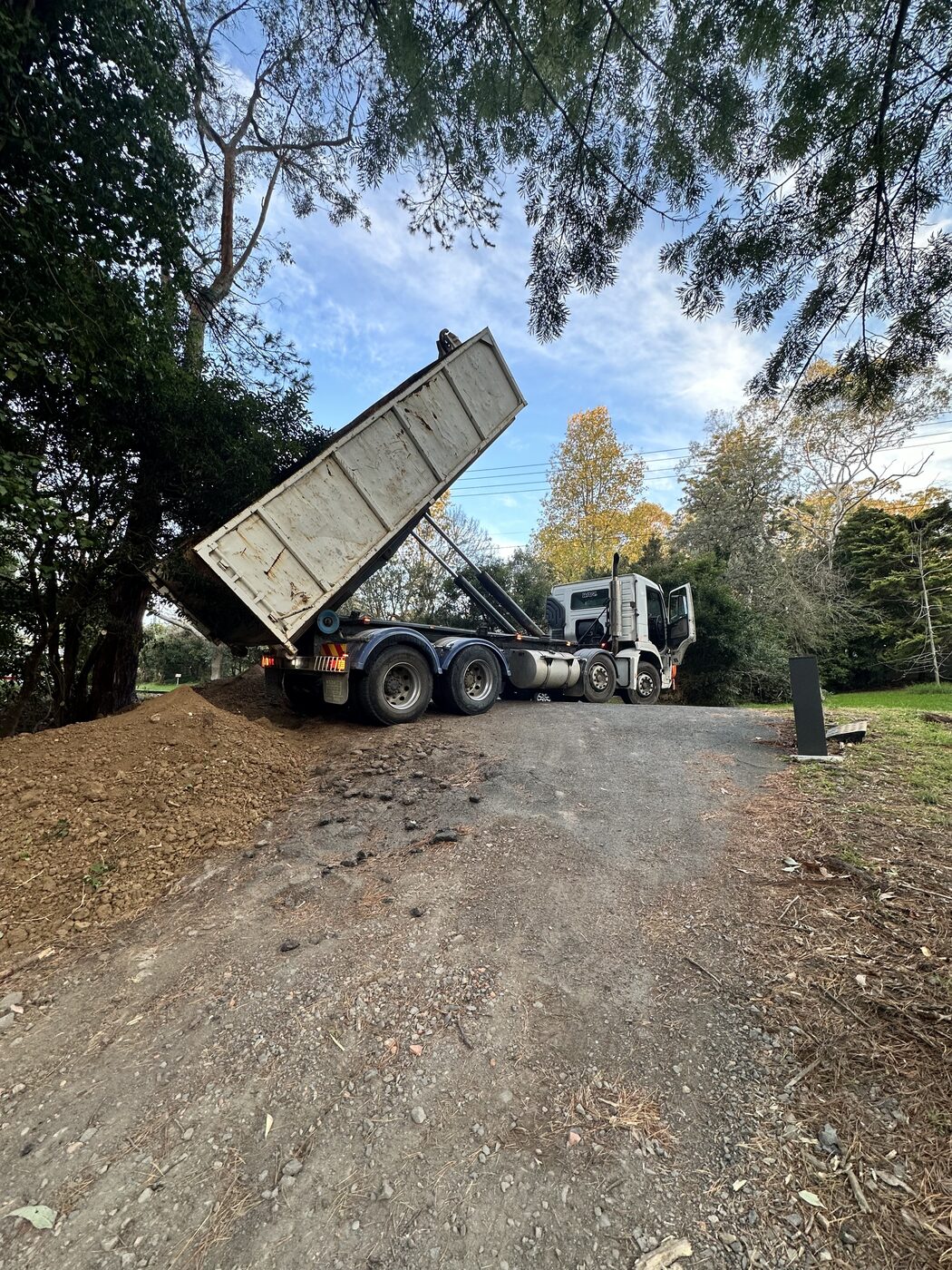 Truck tipping fill off on site
